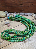 Four-Strand Green Turquoise Sphere Bead Necklace 32 in