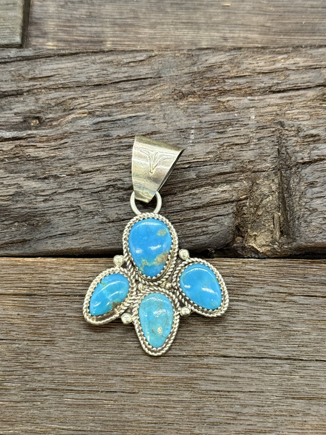 Half Cluster Turquoise Pendant by Ernest Hawthorne