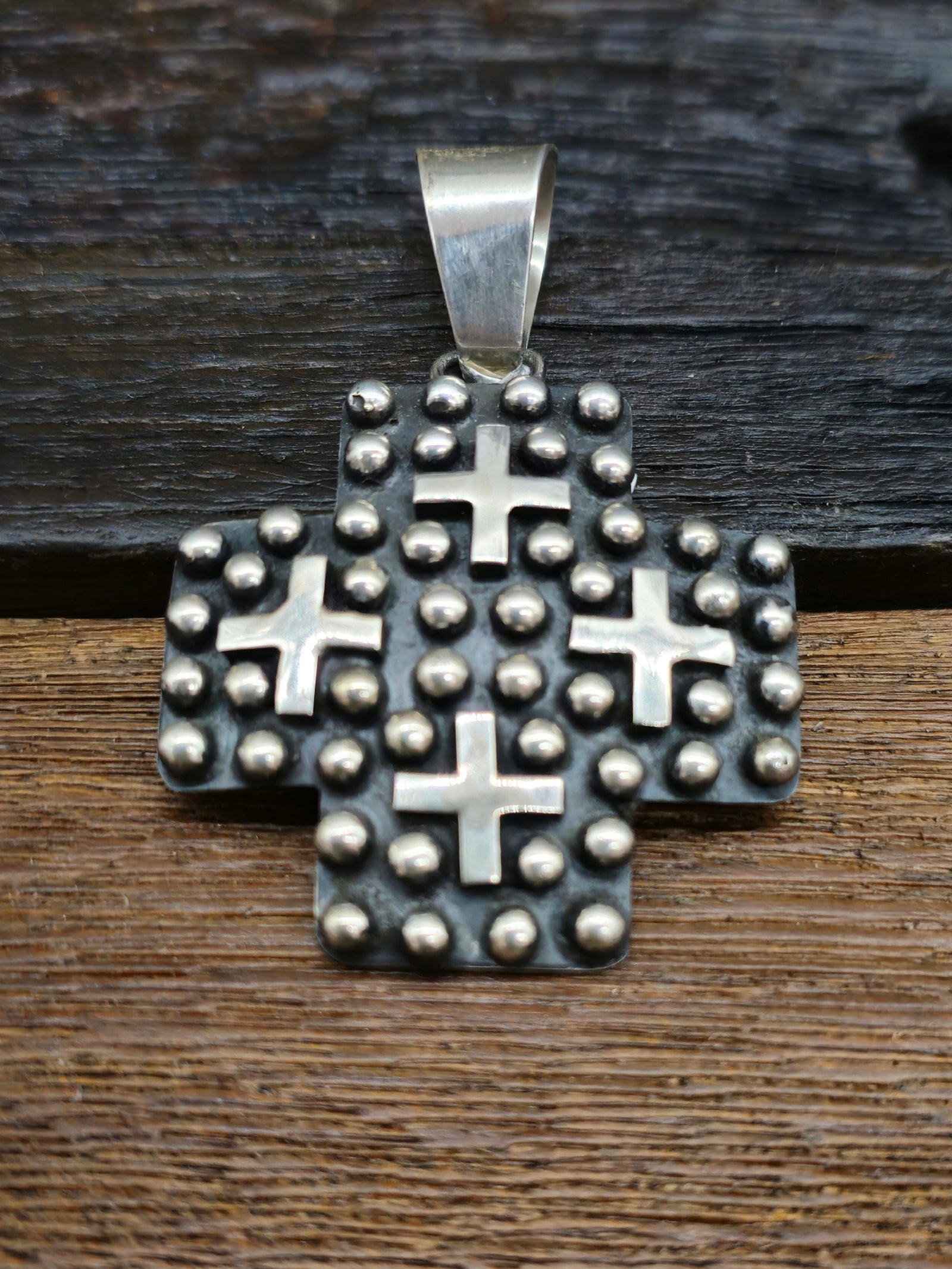 Medium Cross-Shaped Sterling Silver Raindrop and Cross Pendant by Geneva Apachito