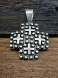 Medium Cross-Shaped Sterling Silver Raindrop and Cross Pendant by Geneva Apachito