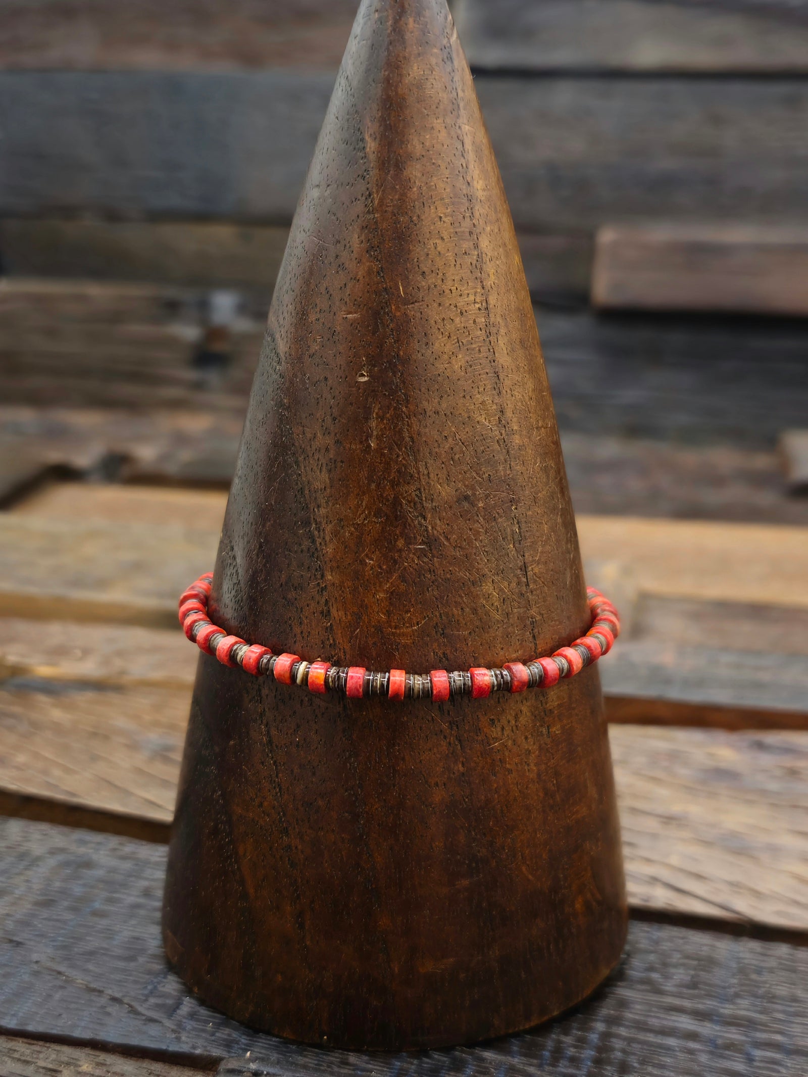 Apple Coral and Brown Heishi Bracelet by Jeanette Calabaza 7.5 in.