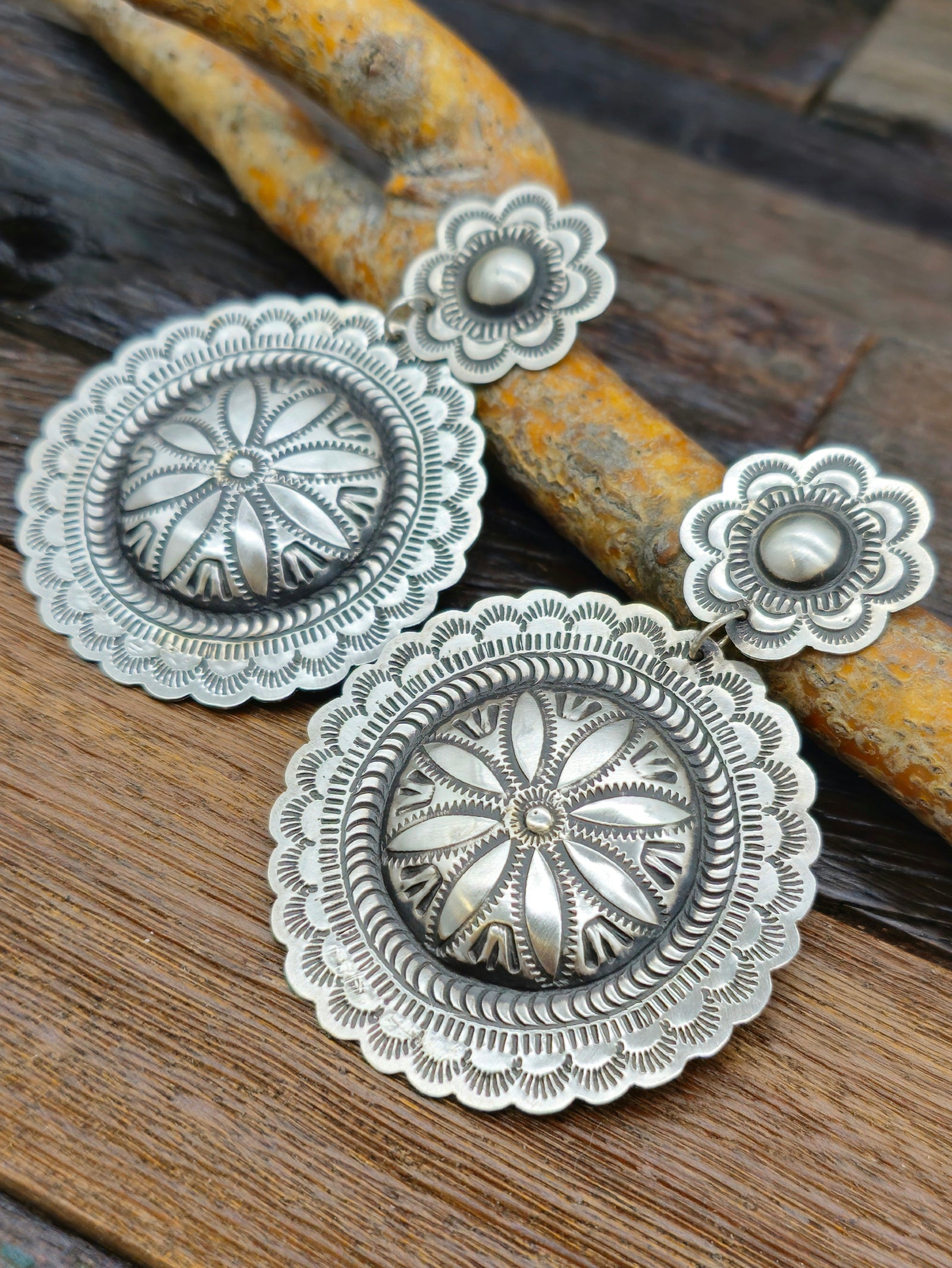 Large Stamped Sterling Silver Circle Earrings by Leander Tahe