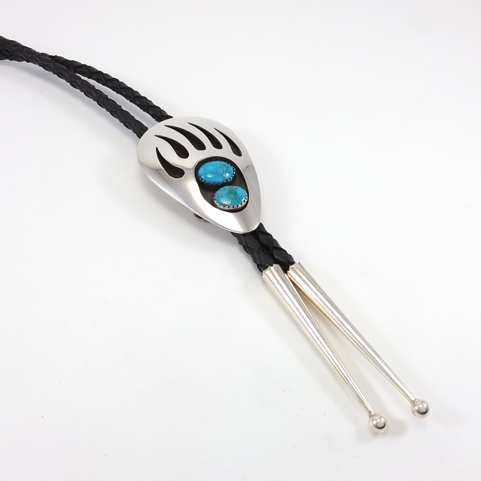 Navajo turquoise sterling silver bear paw shadow box bolo.