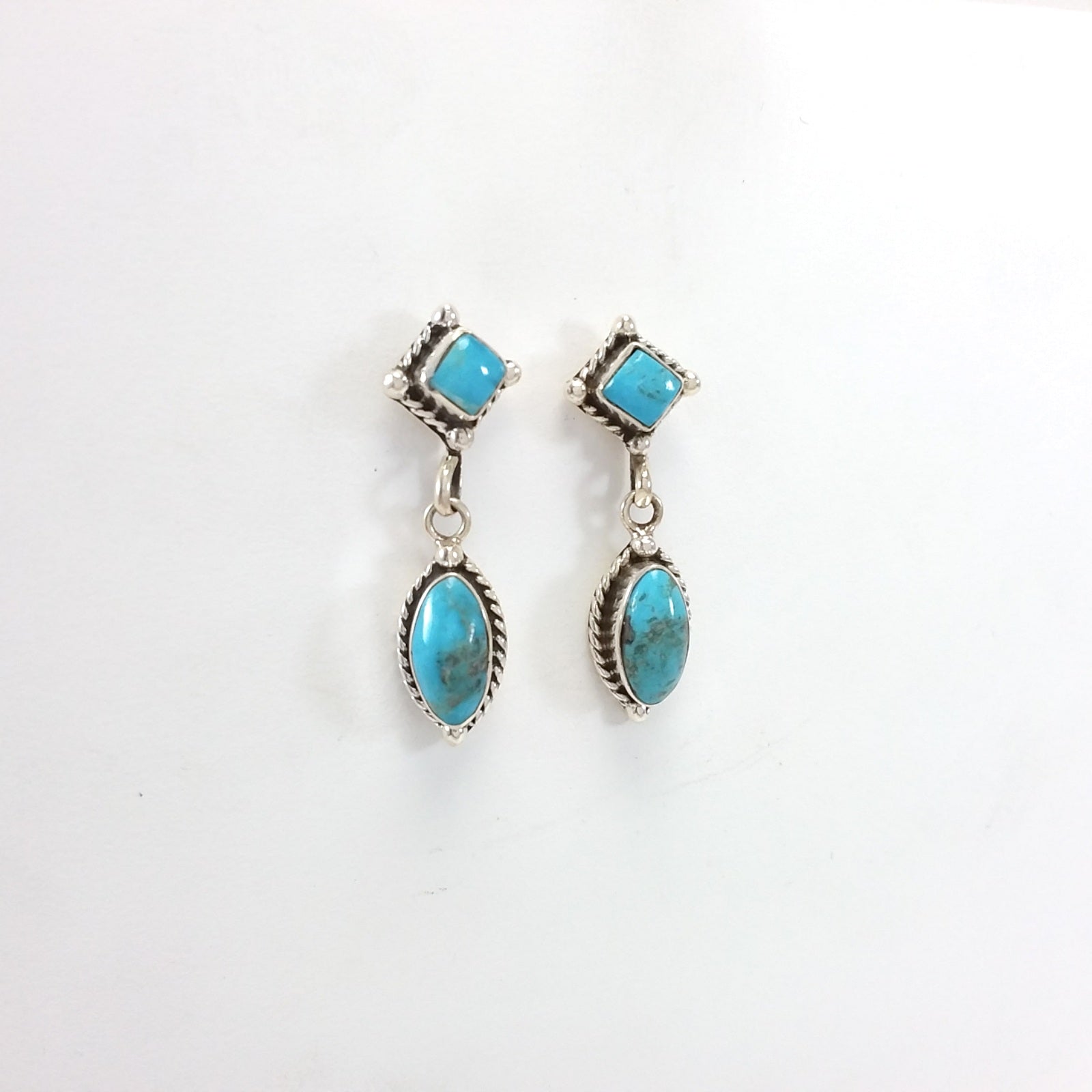 Navajo turquoise sterling silver earrings.