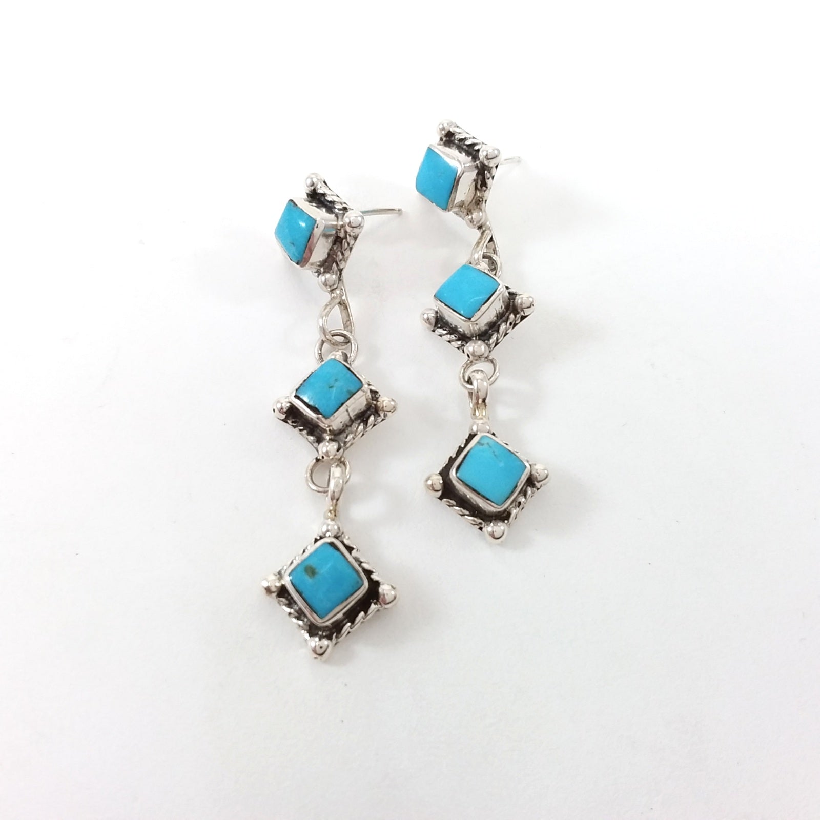 Navajo turquoise sterling silver earrings.