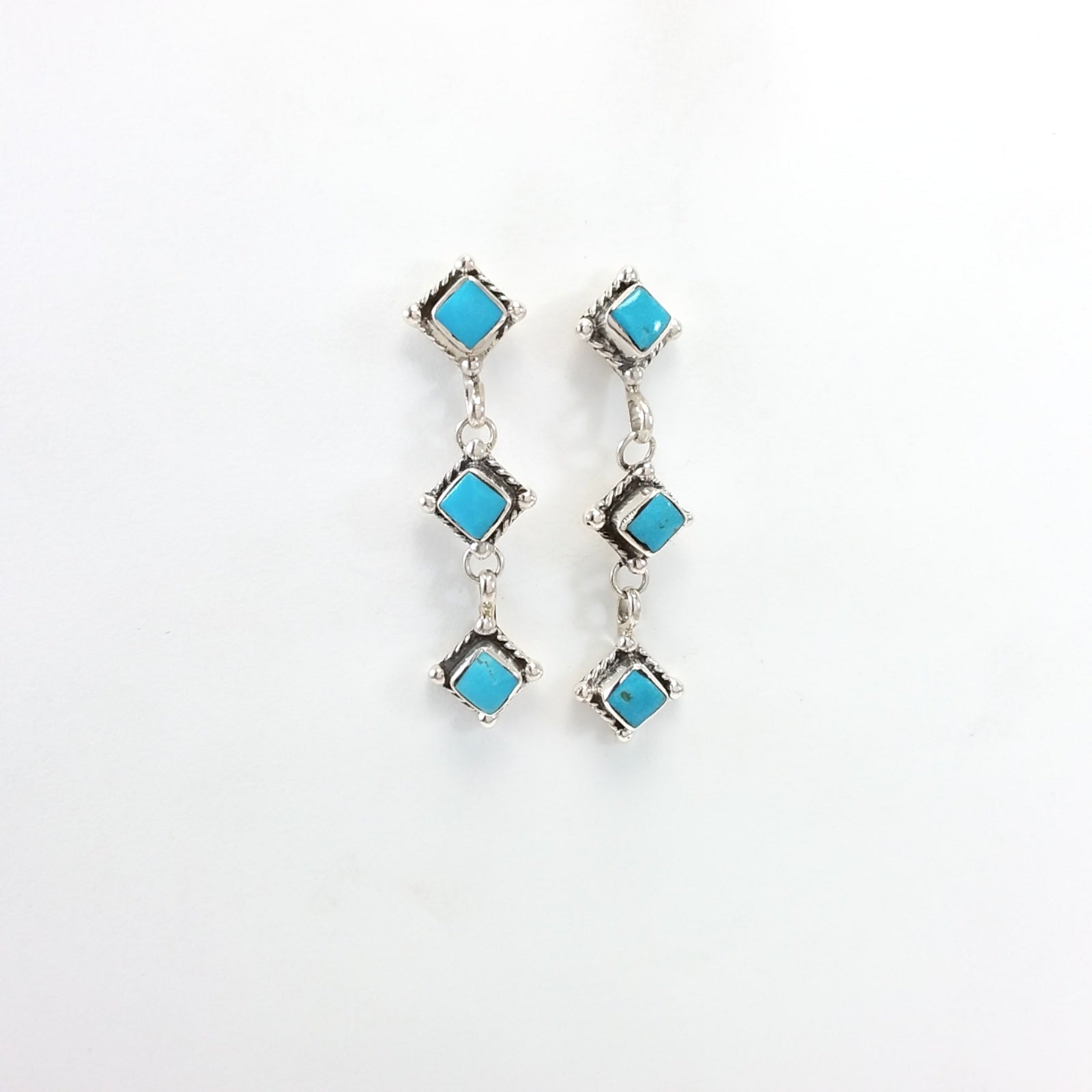 Navajo turquoise sterling silver earrings.