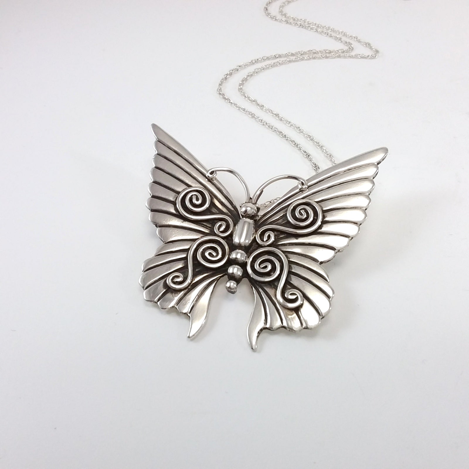 Navajo sterling silver butterfly pin/pendant.