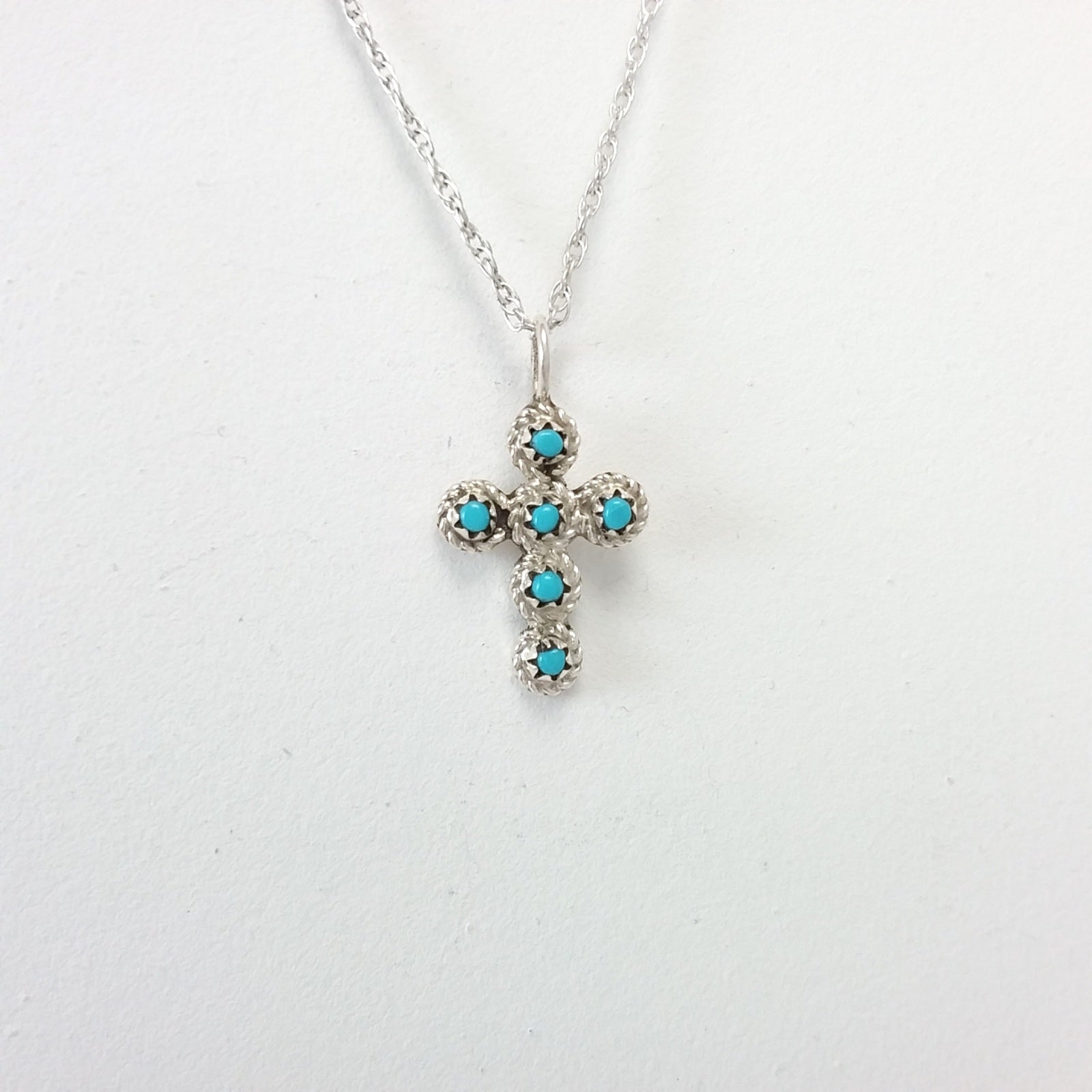 Navajo turquoise sterling silver cross pendant.