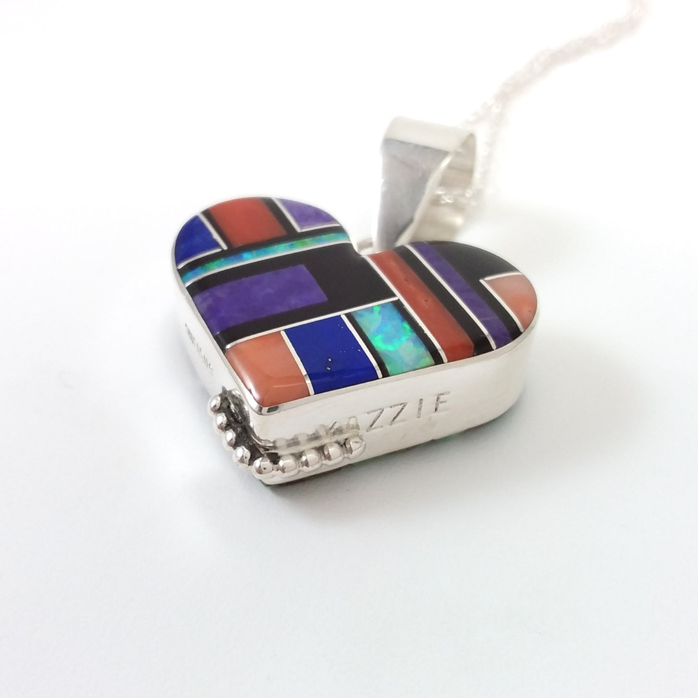 Edison Yazzie Navajo multi stone sterling silver reverible pendant.