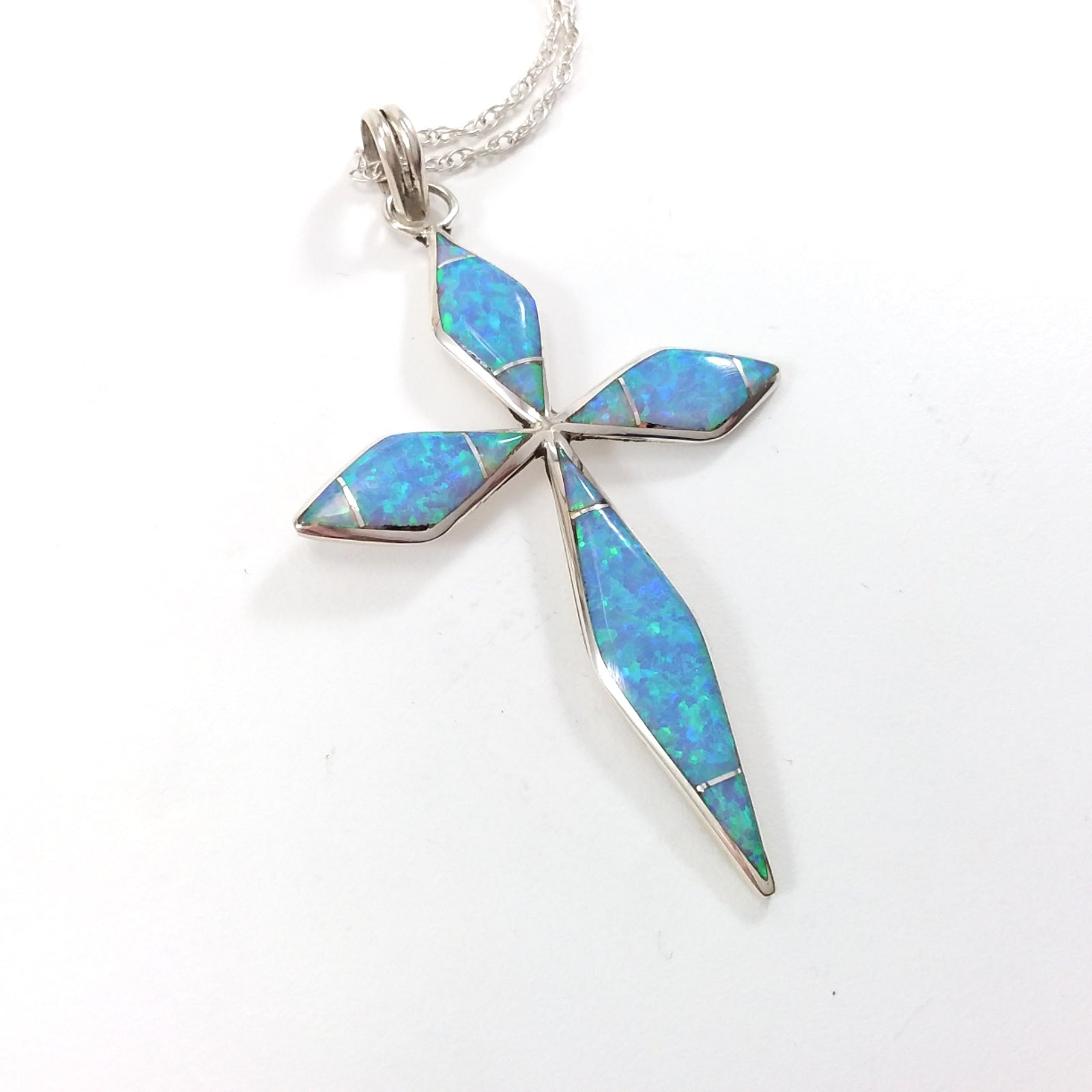 James Kee Zuni Pueblo opal sterling silver inlay cross pendant.