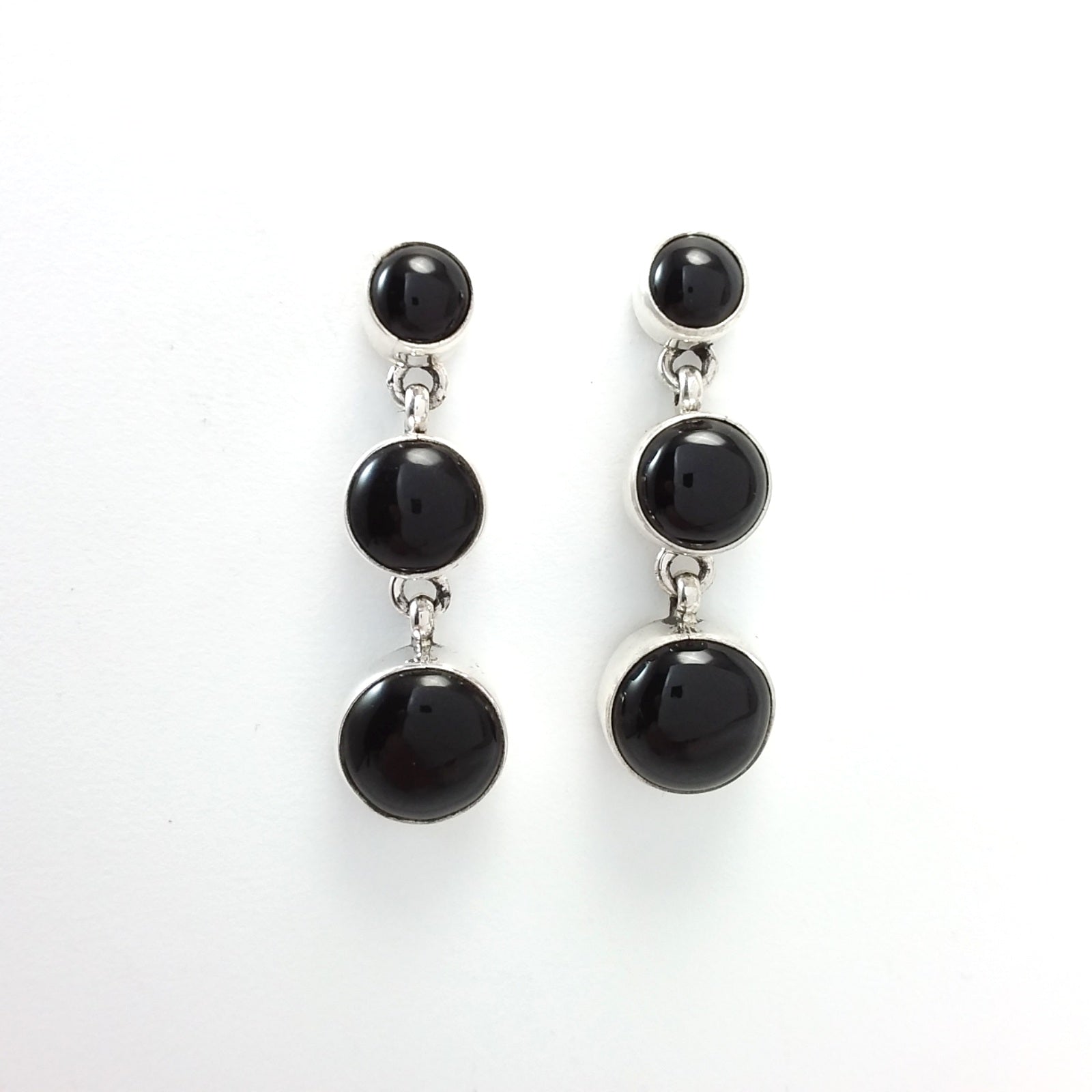 Navajo Peggy Skeets onyx sterling silver earrings.