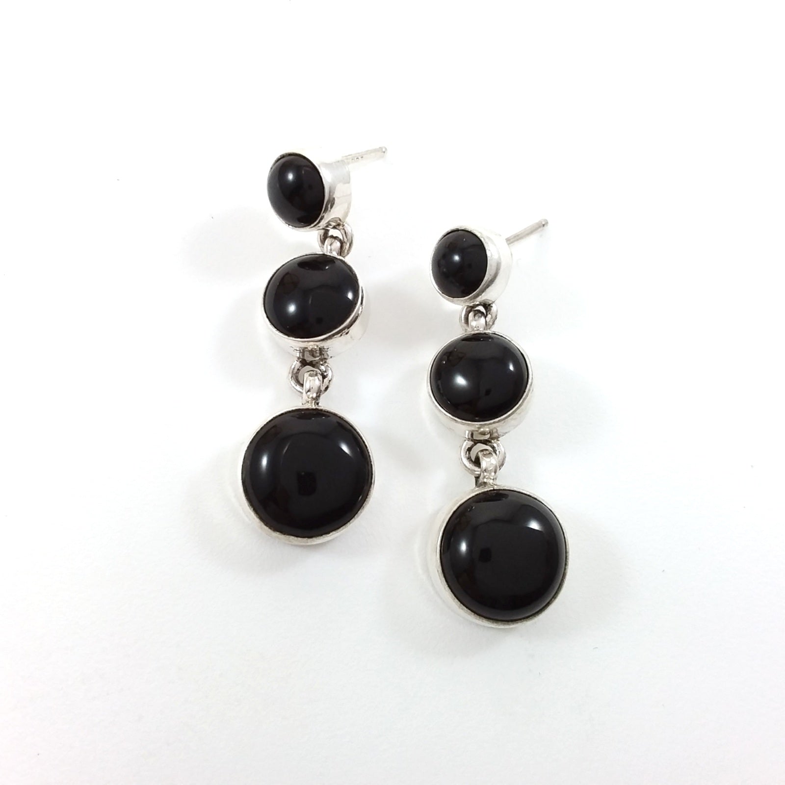 Navajo Peggy Skeets onyx sterling silver earrings.