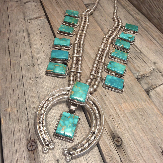 Nita Edsity Navajo turquoise sterling silver squash blossom necklace.