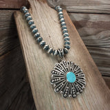 Jonathan Nez Turquoise Flower Pendant