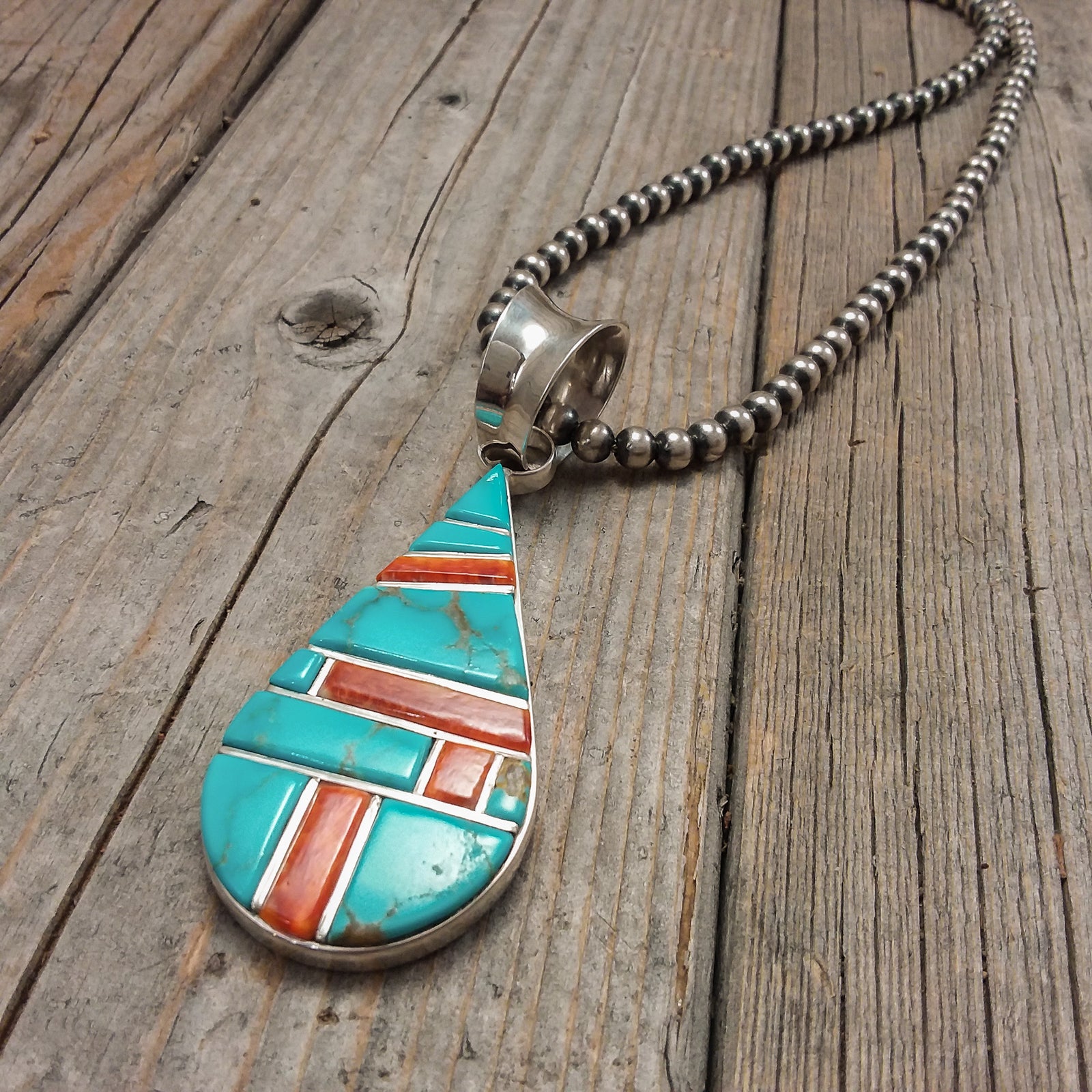 Turquoise/Spiney Oyster Pendant By Ervin Tsosie